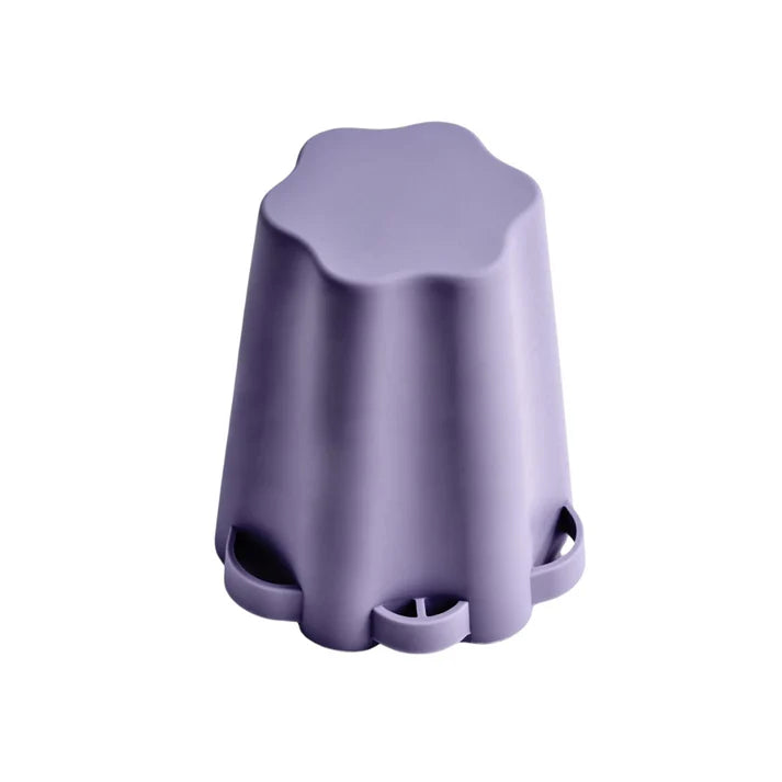 Cepillo de Silicona para Cuidado Facial en color púrpura, ideal para limpieza suave de la piel.